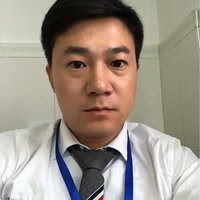 康明伟